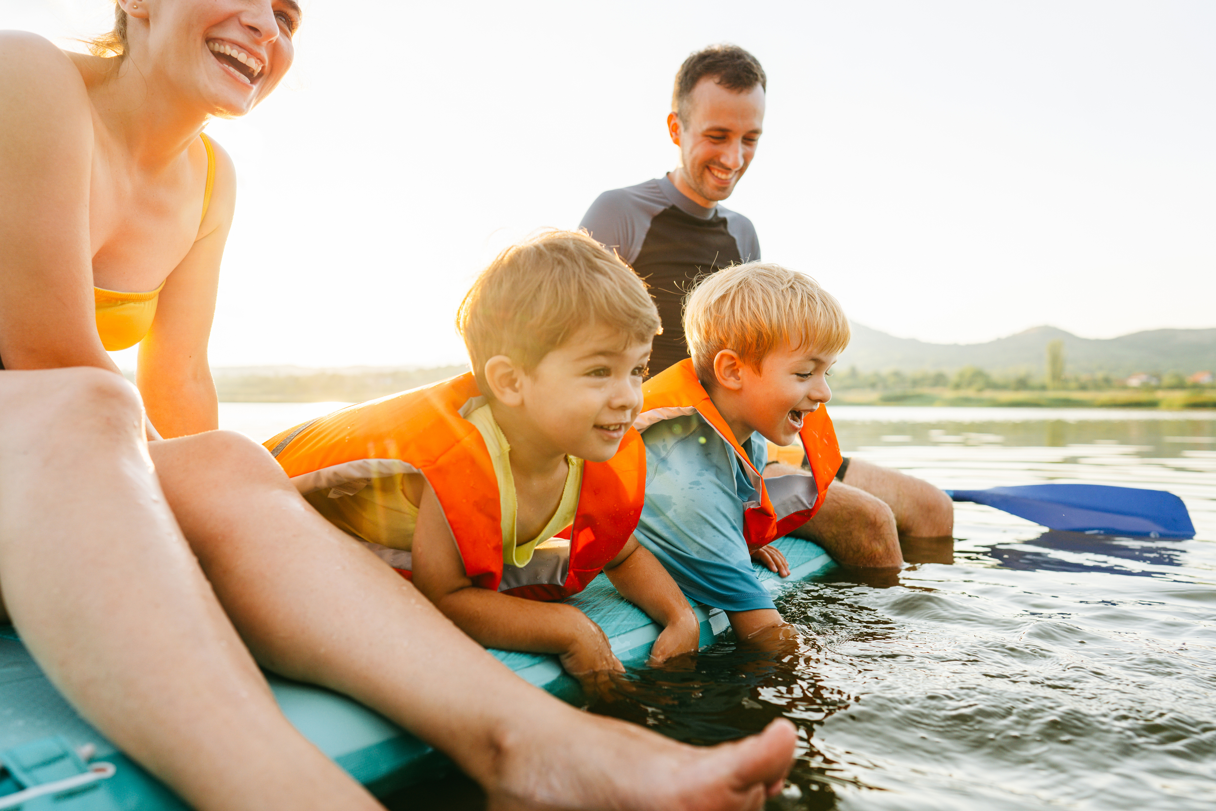 Family enjoying outdoor fun on Lake Vermilion at Fortune Bay Resort Casino